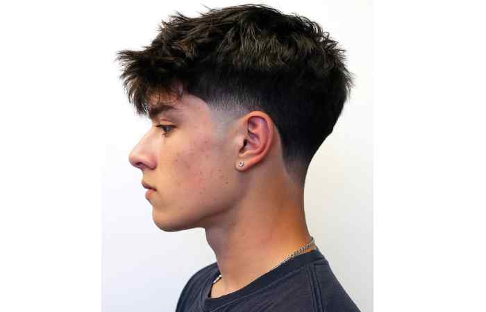 wavy fringe with clean low taper hairstyle